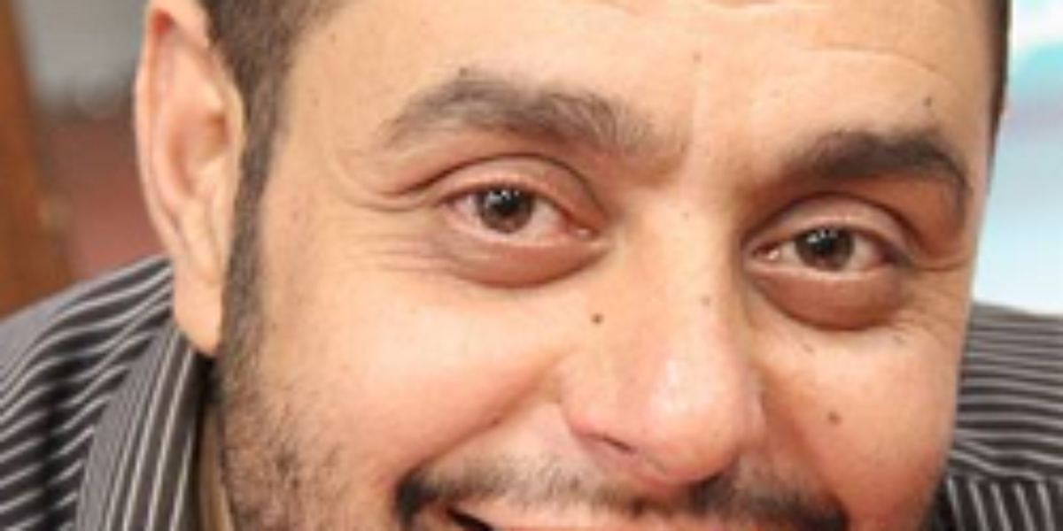 الكاتب أيمن العتوم